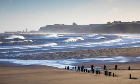 Rough sea in Winter Sunshine Sandsend near Whitby North Yorkshire
